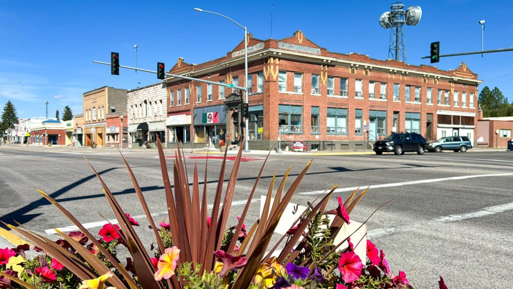 Main street corner with fall flowers in St. Anthony